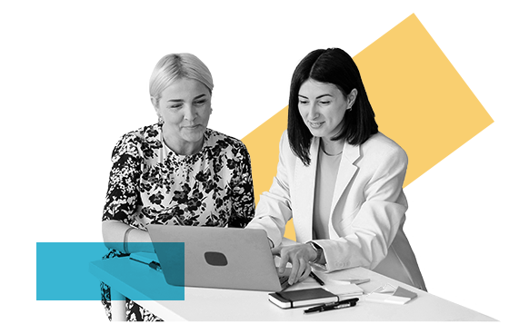 A female Nationwidetrustuk Bank teller working on a laptop with a customer